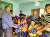 Distribution of Track Suits to the students - with help of Indian Light Foundation, Holland